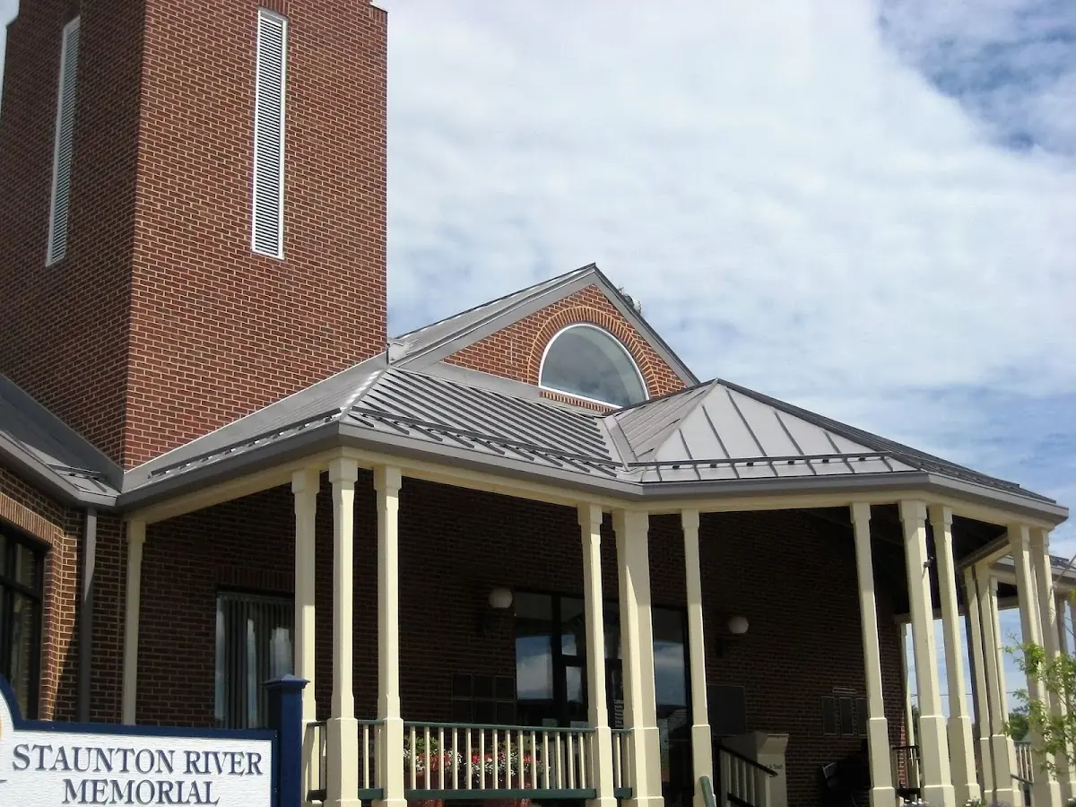 Skilled roofing craftsmen working on a residential roof in Archdale